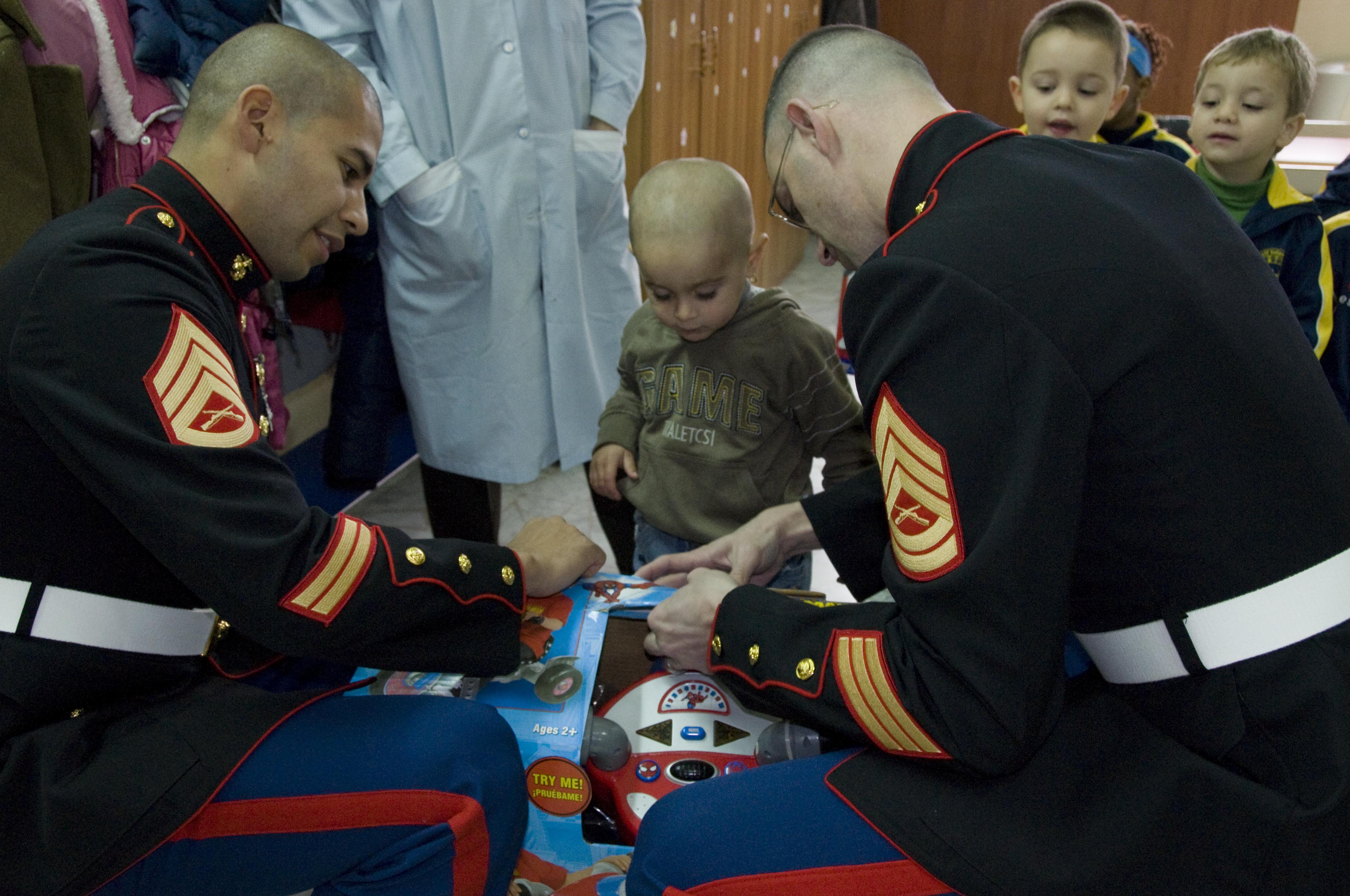 Marines donate toys during a Toys for Tots event