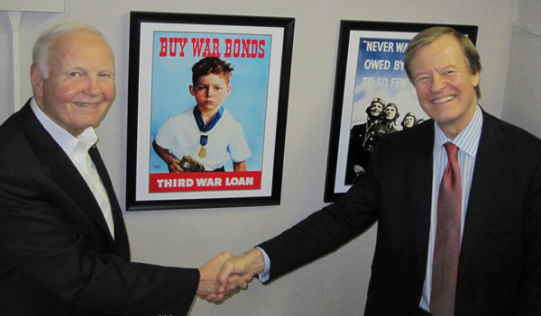 Bruce Whitman, President & CEO FlightSafety International (left) with Scott Higgins at Flight Safety's headquarters.