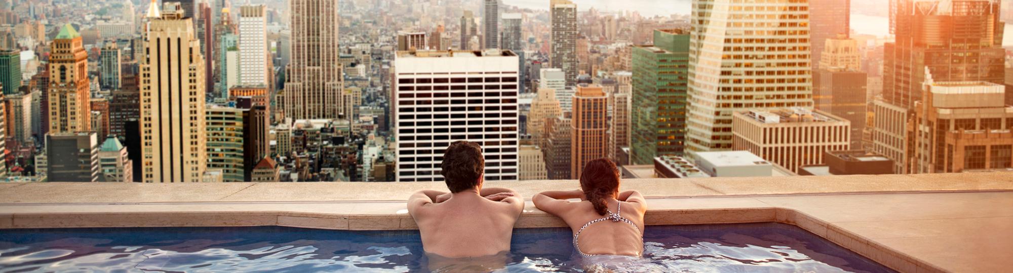 tryp deal hero couple in hotel pool