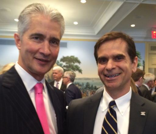 Jeff Smisek, of United Airlines, poses for a picture with Veterans Advantage VP of Marketing, Roy Asfar