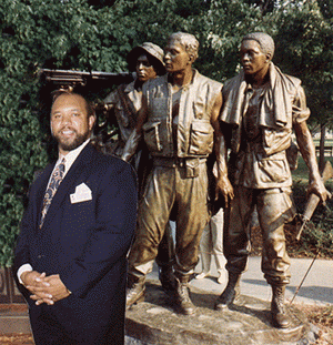 Tyrone T. Dancy at the Frederick Hart sculpture at the Vietnam Veterans Memorial, Washington, D.C.