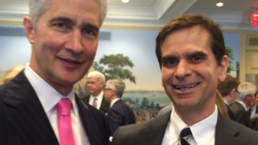 Jeff Smisek, of United Airlines, poses for a picture with Veterans Advantage VP of Marketing, Roy Asfar