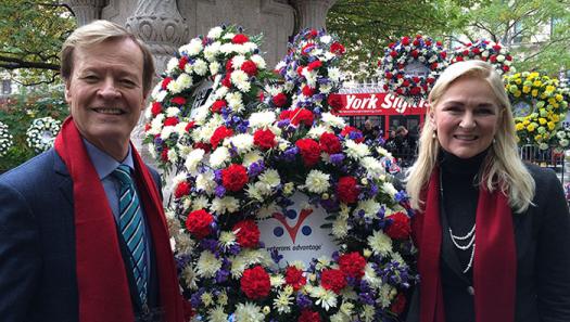 Veterans Advantage Founders Scott and Lin Higgins with the company's memorial wreath.