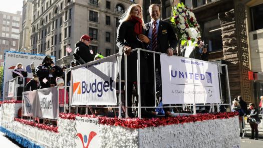 Scott and Lin on the Veterans Day Parade Float