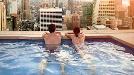 tryp deal tile couple in hotel pool
